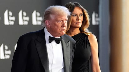 El presidente de EE UU, Donald Trump, acompañado de su esposa, Melania, este martes en Washington. 