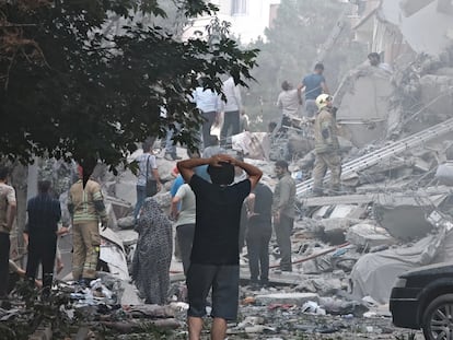 TEHRAN, IRAN - JUNE 13: People look over damage to buildings in Nobonyad Square following Israeli airstrikes on June 13, 2025 in Tehran, Iran. Iran's three top military generals were killed in the attacks that also targeted nuclear and military facilities, according to published reports. Israel described the strikes as preemptive to keep Iran from obtaining nuclear weapons, the reports said.  (Photo by Majid Saeedi/Getty Images)