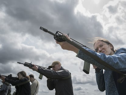 Agnieszka Pappe learning to handle an unloaded rifle on May 31.